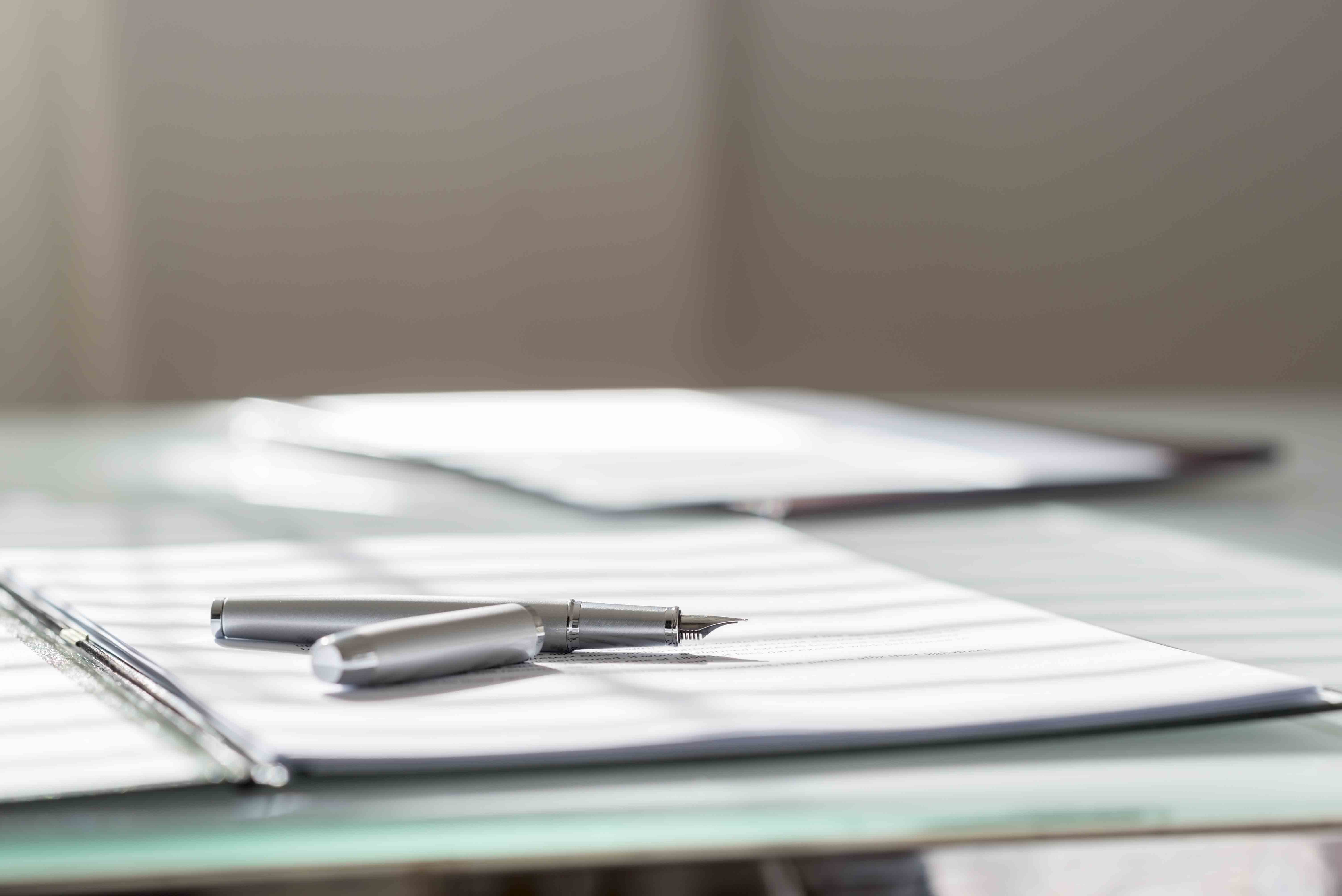 Pen and paper stock image
