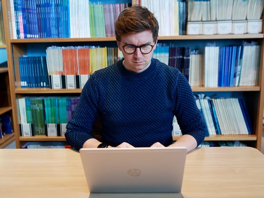 Man searching computer